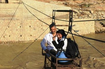 مامایی که در سیلاب امید را زنده کرد